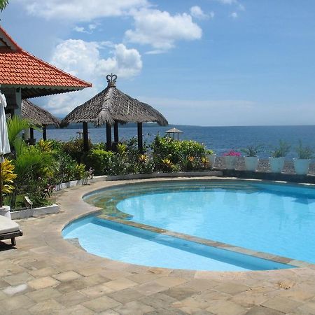 Kembali Beach Bungalows Амед Экстерьер фото