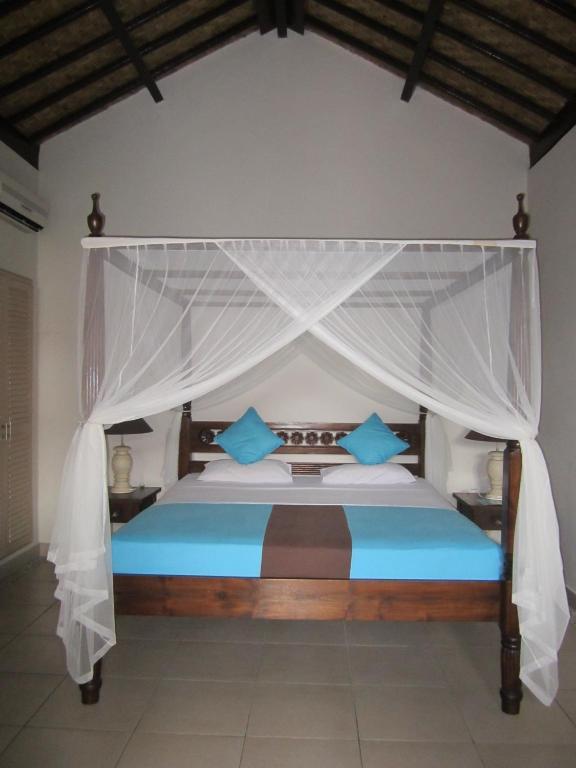 Kembali Beach Bungalows Амед Номер фото